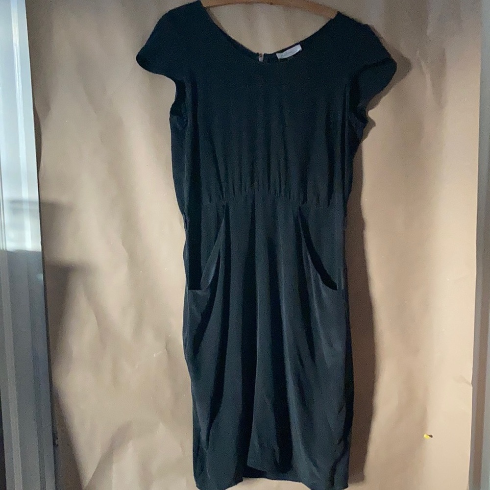 Black dress with pockets, exposed zipper